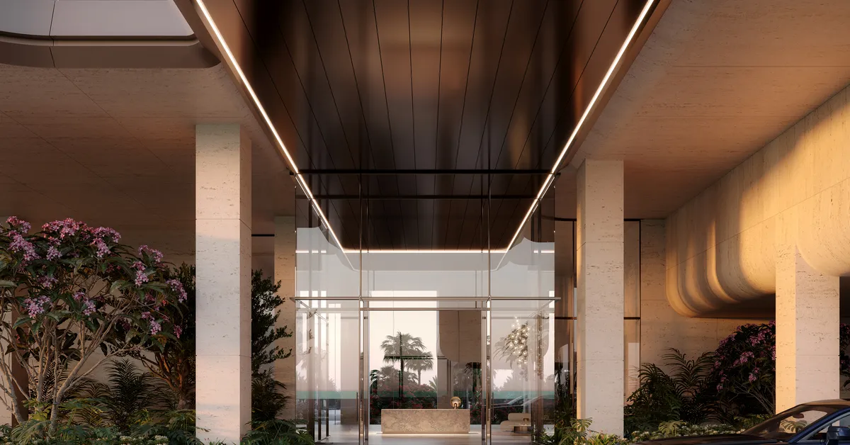 نمای کامل The Alba Residences هنگام غروب با نورپردازی واحدها