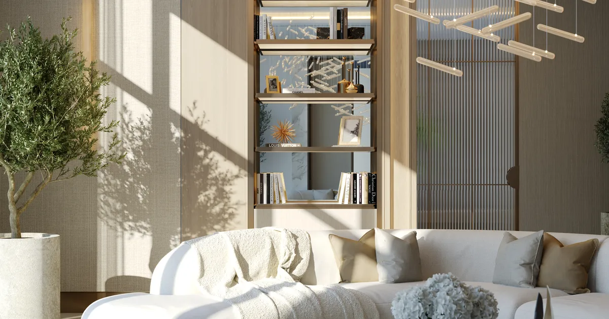 گوشه نشیمن Great Room با قفسه کتاب دکوری و درخت زیتون